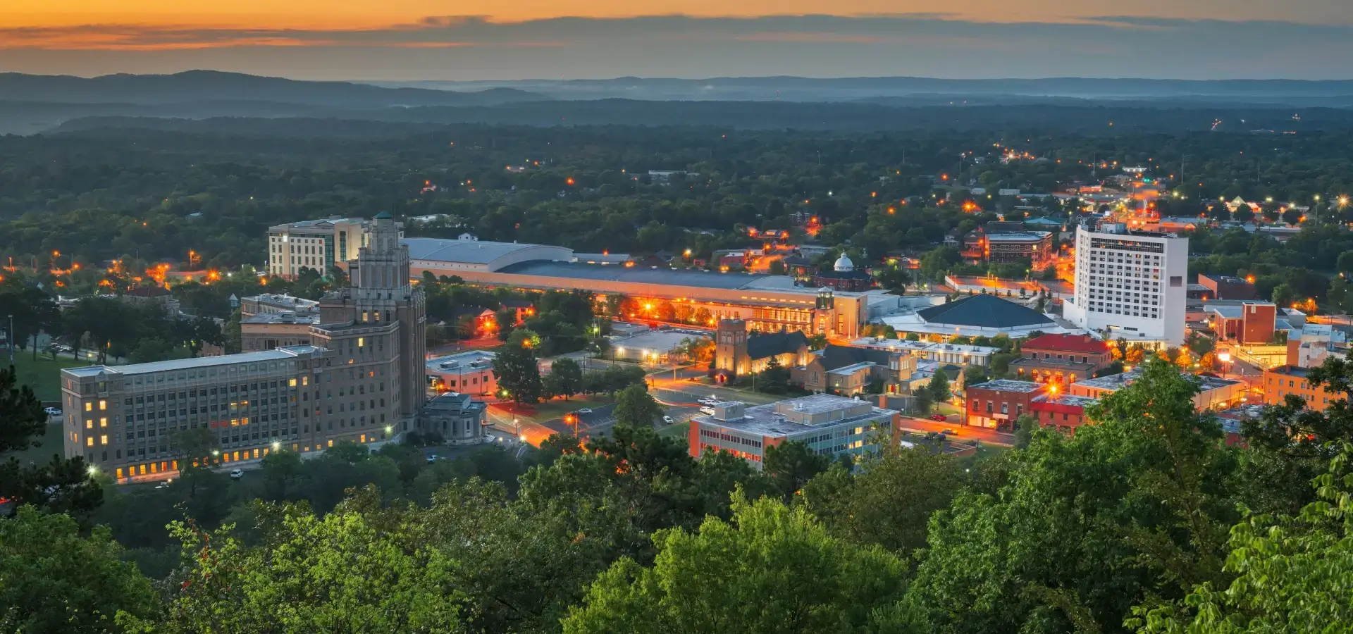 Aerial view of downtown city at dusk
